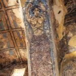 Audience hall east transverse arch detail of woman carrying a vessel from frescoes on underside of arch